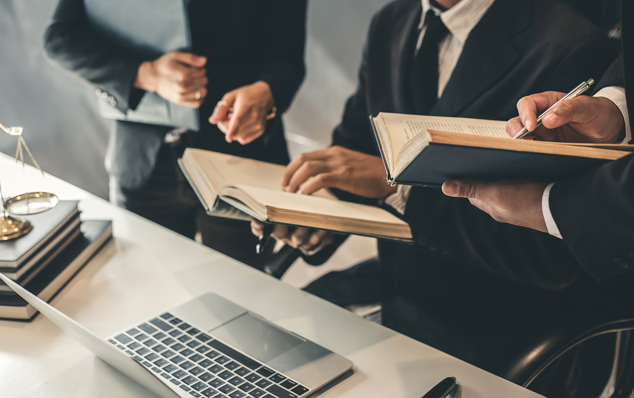 A legal team preparing notes