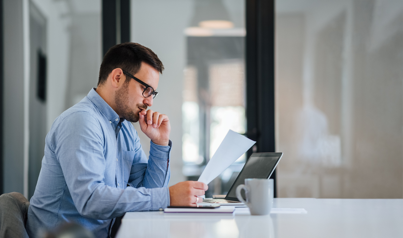 Young male legal professional at work in an office