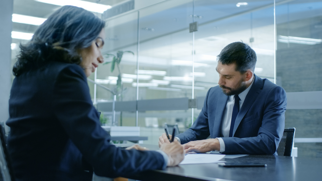 Accountant and solicitor working collaboratively