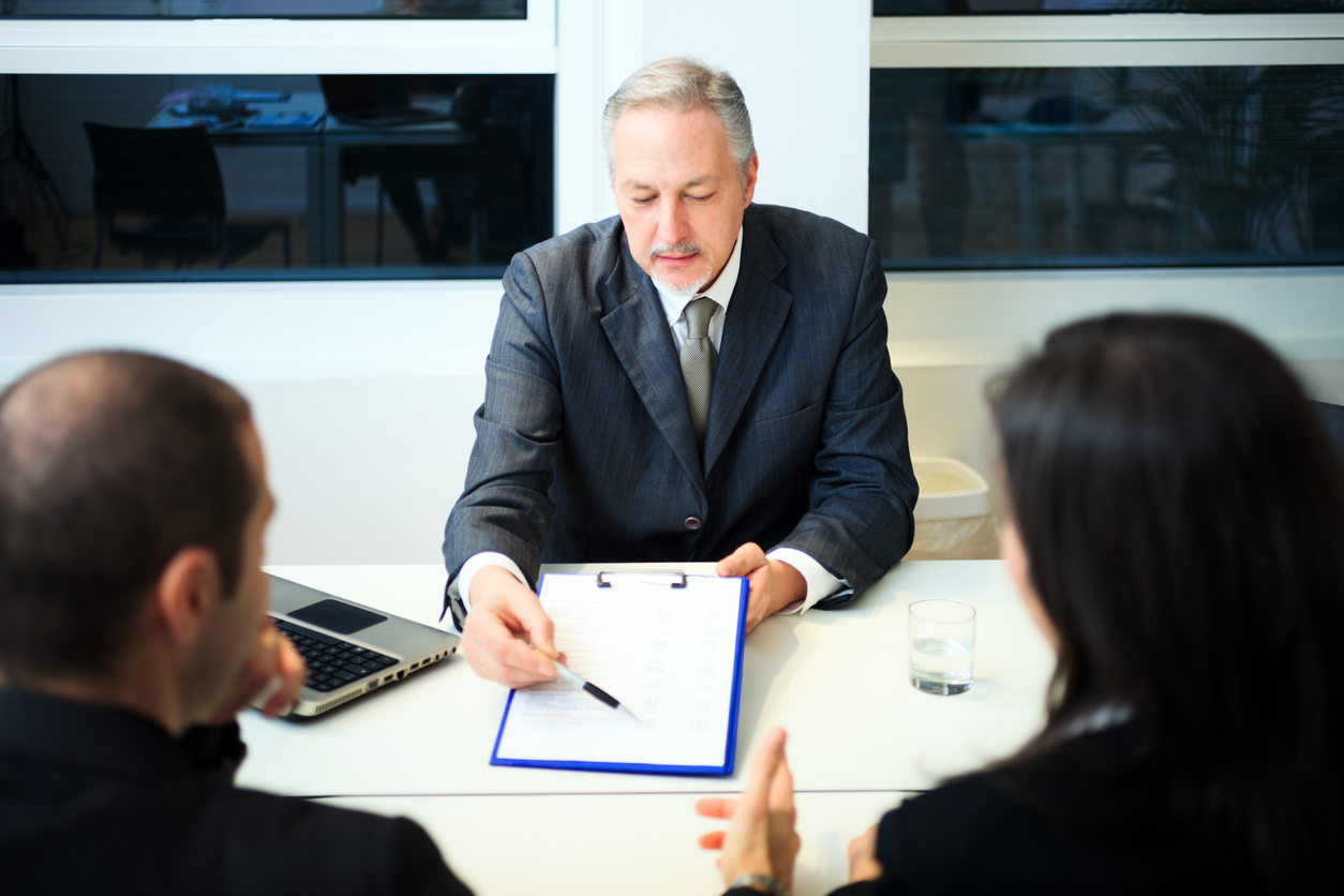 Divorce lawyer meeting with couple