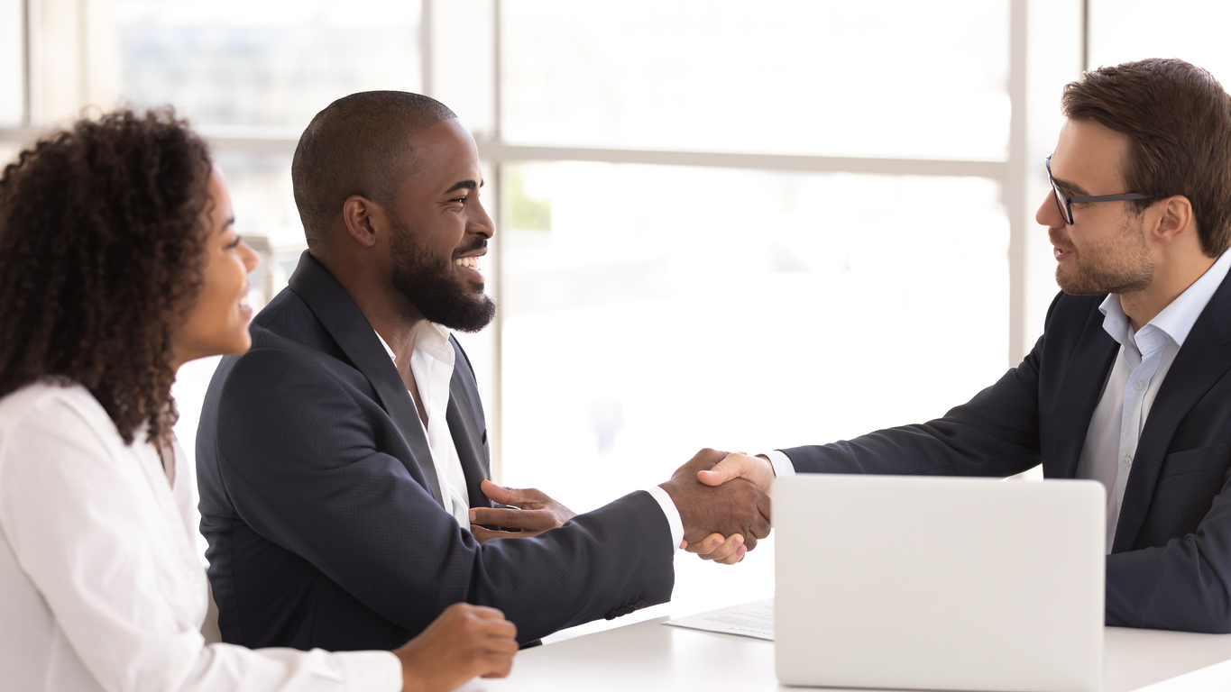 Young couple meeting with a lawyer