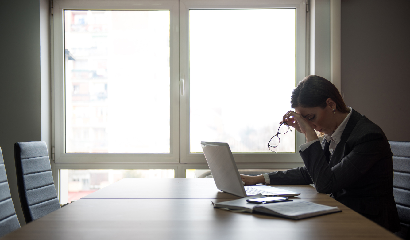 Anxious legal professional in an empty office