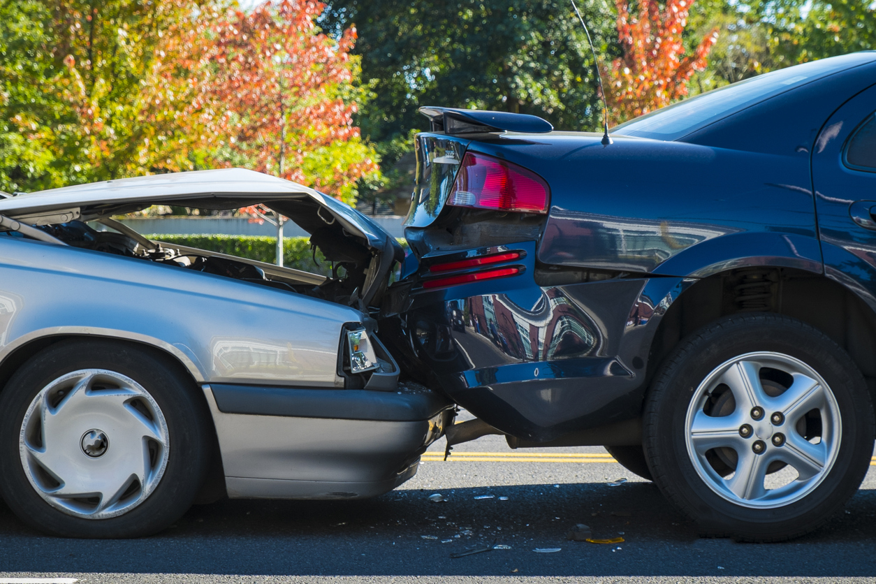 Rear-end collision between two cars on a city street