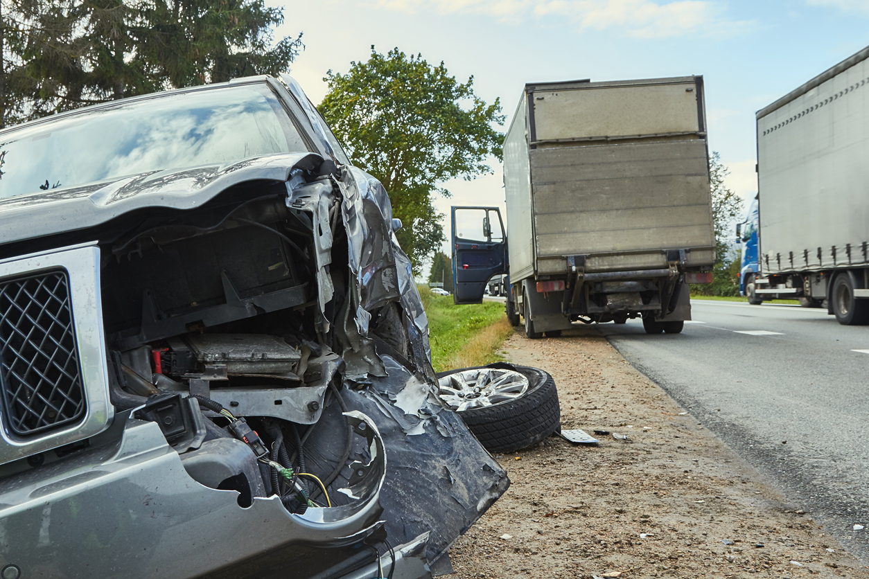 Car collision with heavy truck