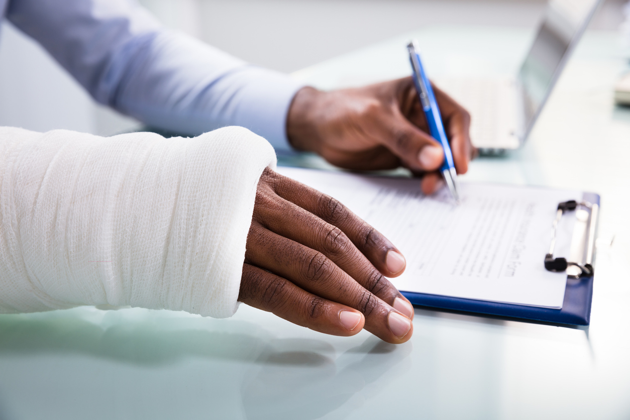 An injured man filing an insurance claim