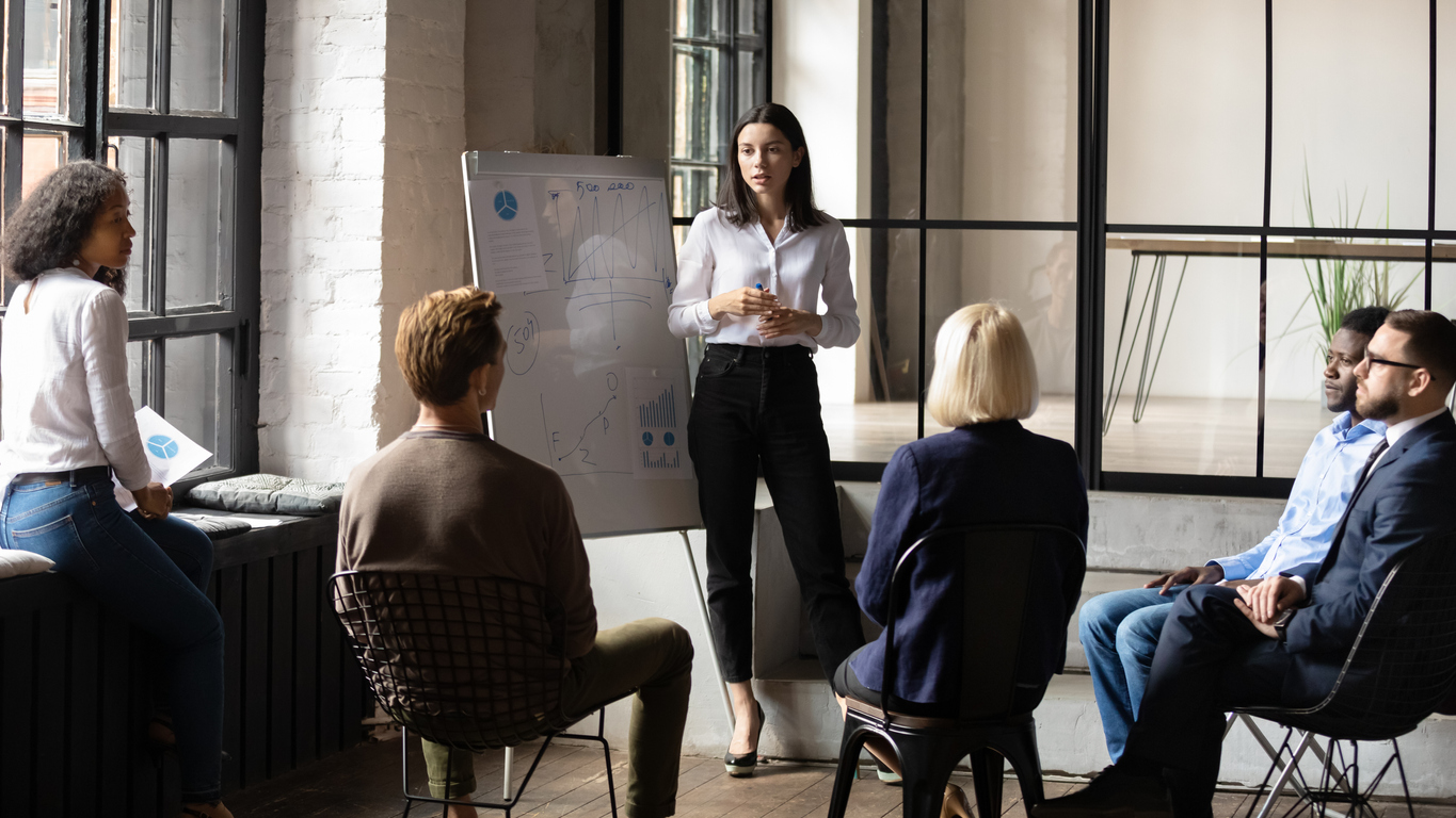 Businesswoman leading team meeting