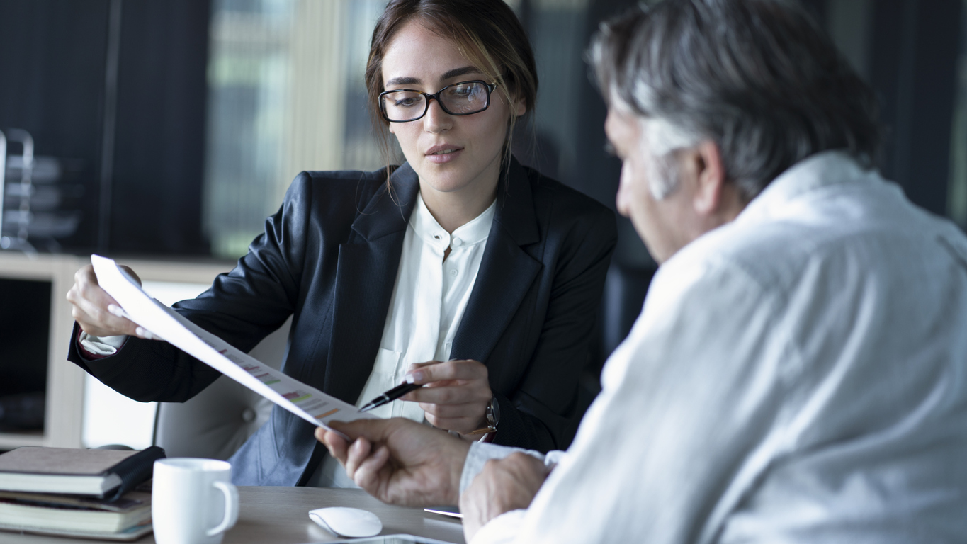 Female lawyer discussing fees with client