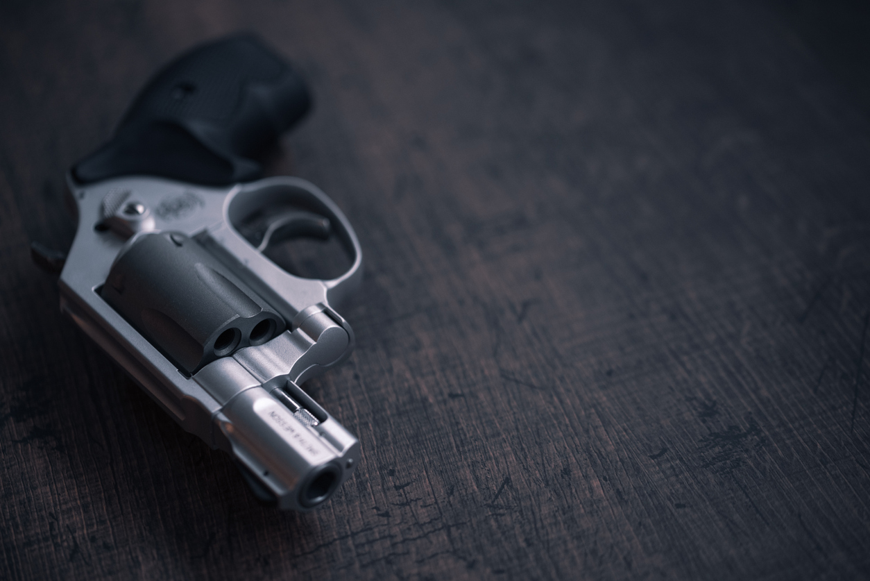 Silver revolver on a table