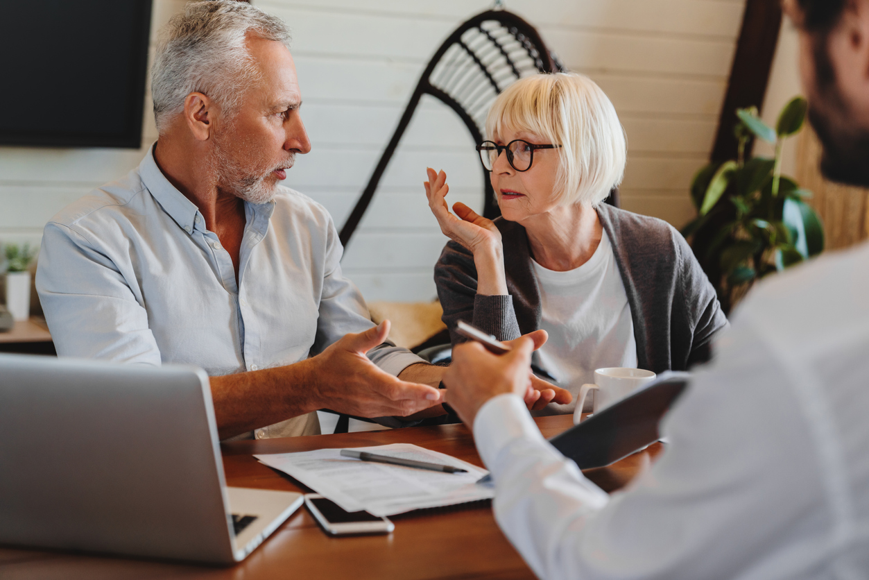 Couple meeting with divorce lawyer