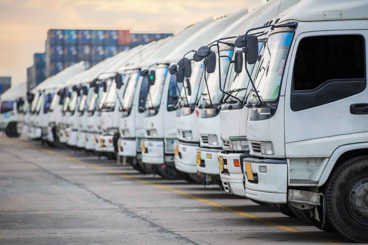 Commercial vehicles; trucks parked in row