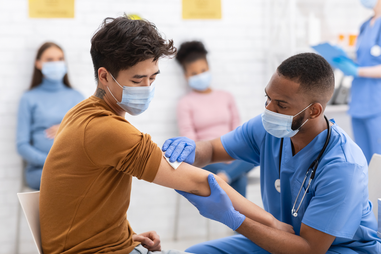 Man receiving Covid-19 vaccine