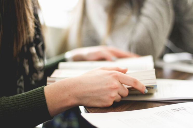 Law student reading text-book