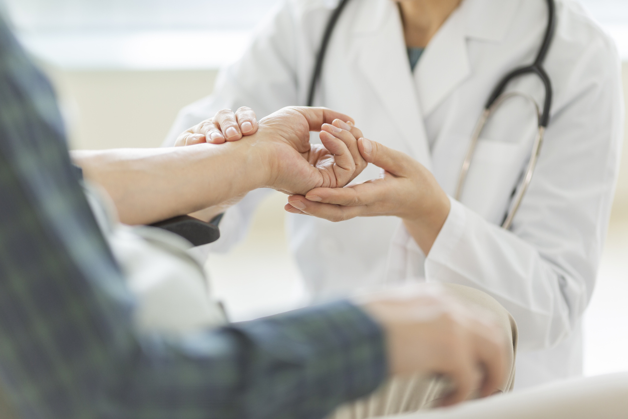 Doctor attending to injured patient