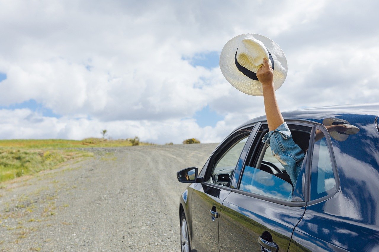 Driving car along road