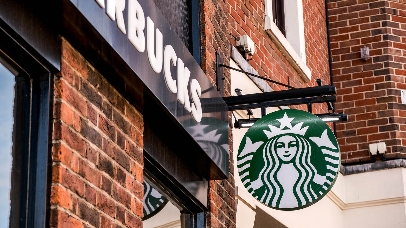 Starbucks sign outside coffeeshop