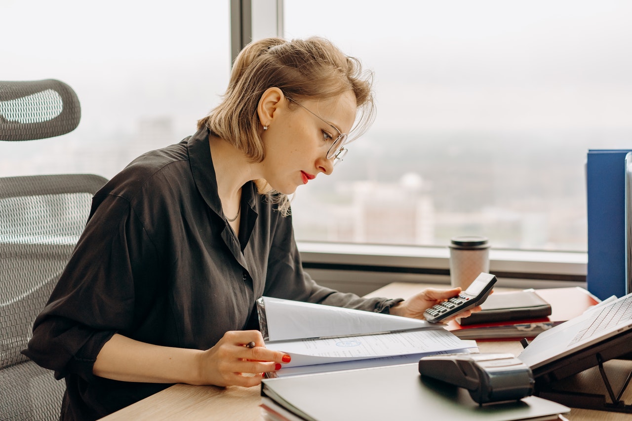 Woman looking at insurance settlement