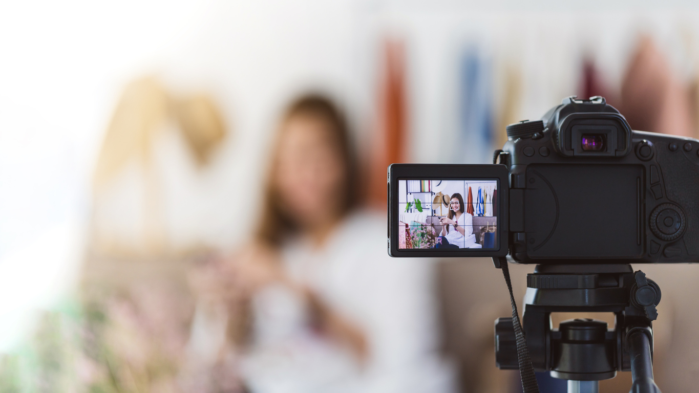 Influencer sat in front of camera