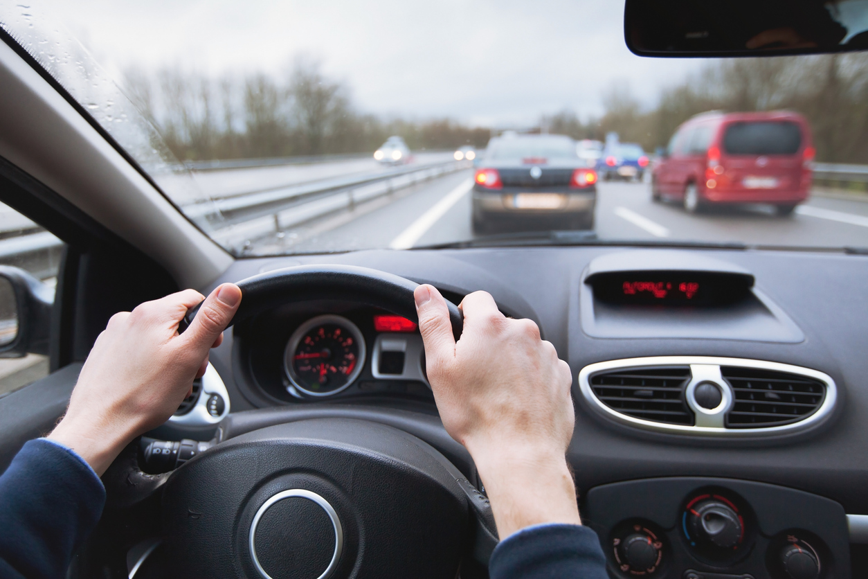 Car driving down highway