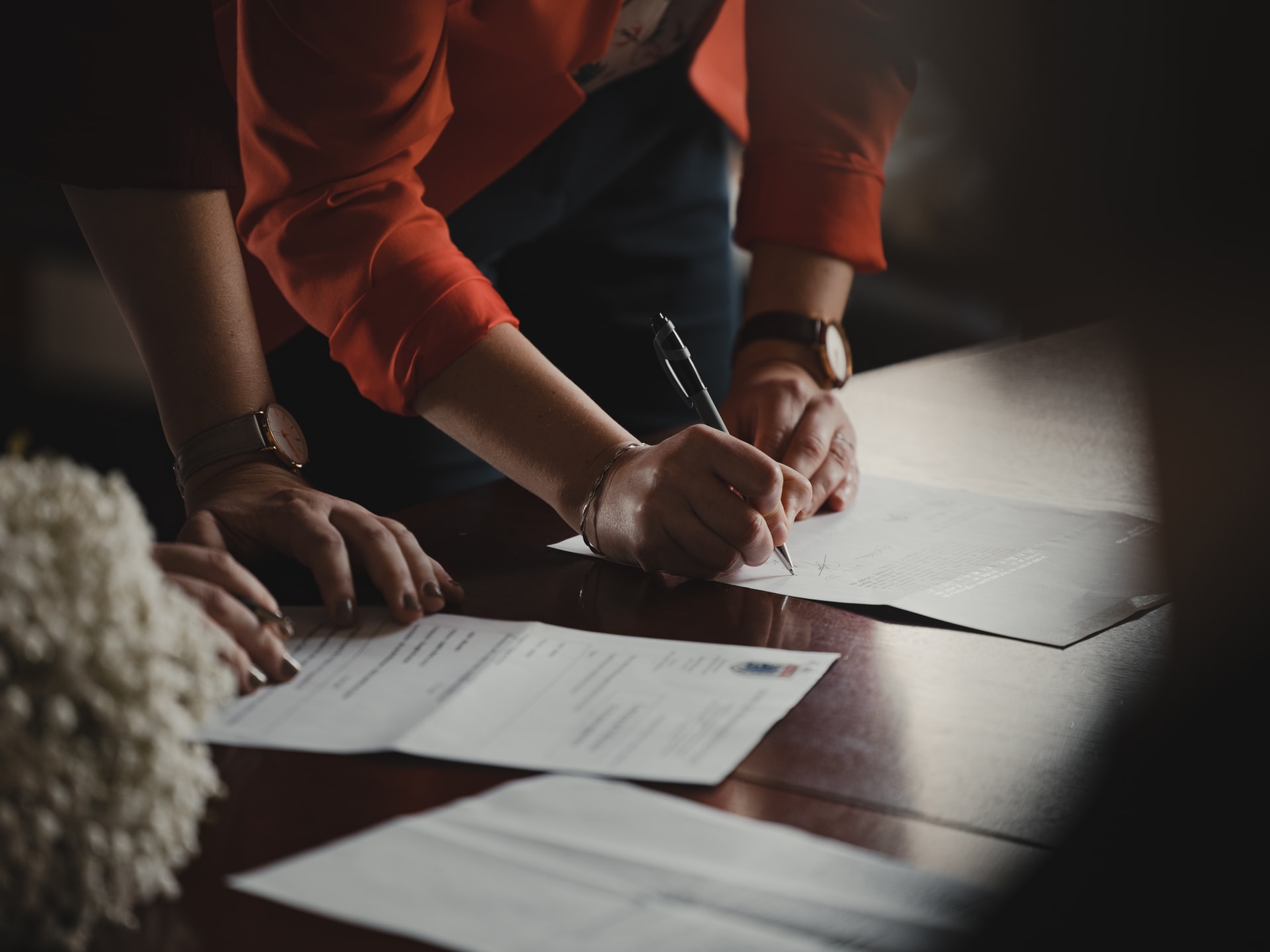 Lawyer signing papers