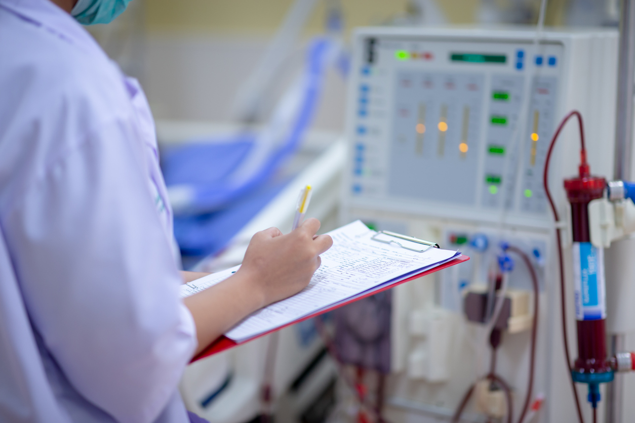 Nurse checking on patient