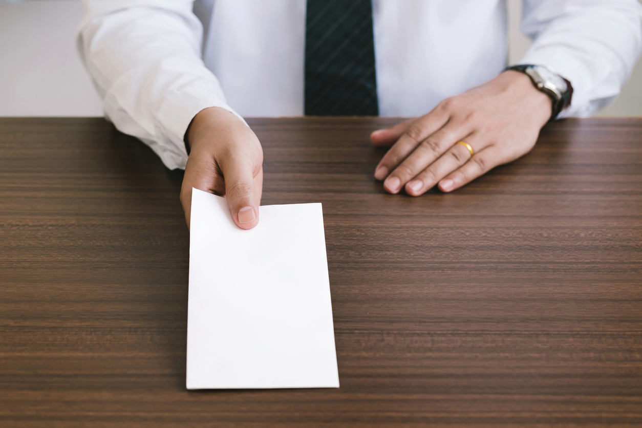 Lawyer handing in resignation