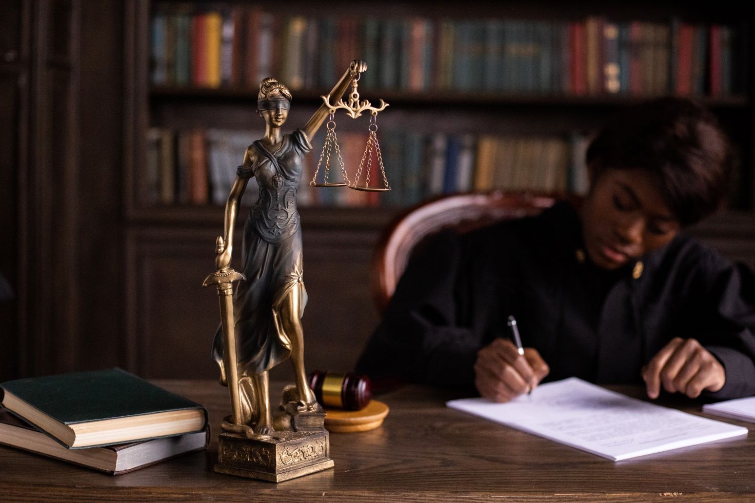 Lady justice on desk