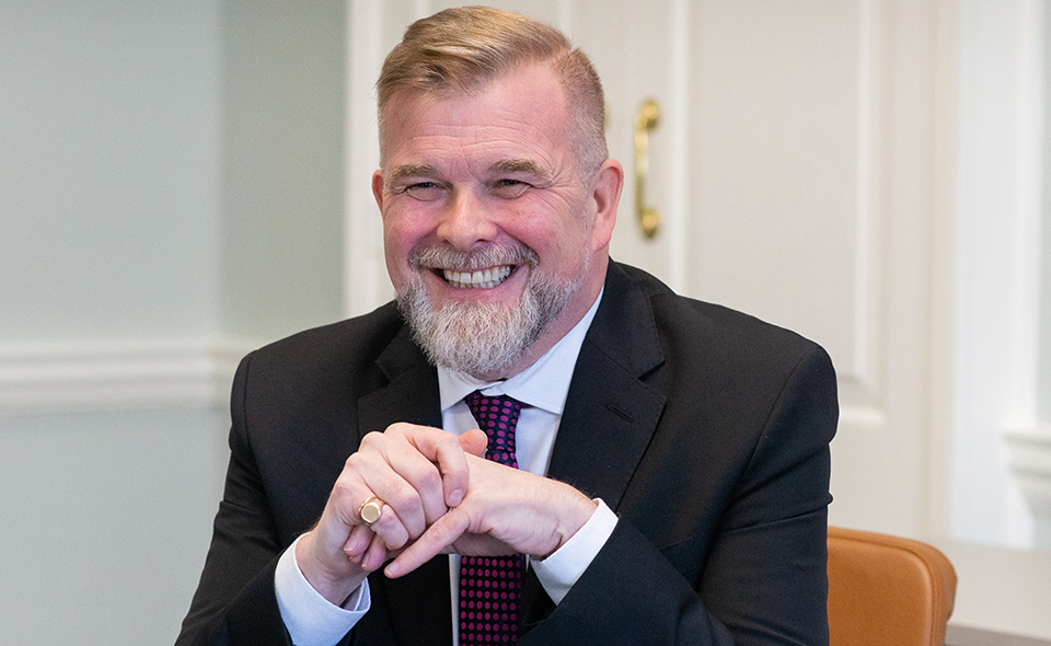 Nick Gallagher, CEO of The Solicitors' Charity, in an office.