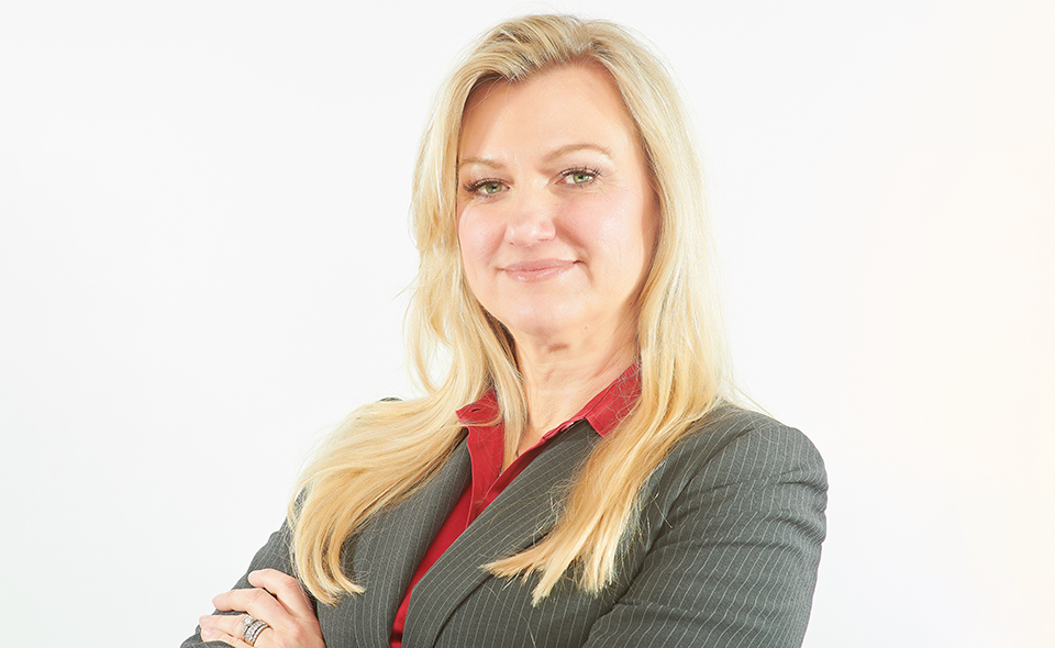 Experienced healthcare lawyer Helen Oscislawski in front of a white background.