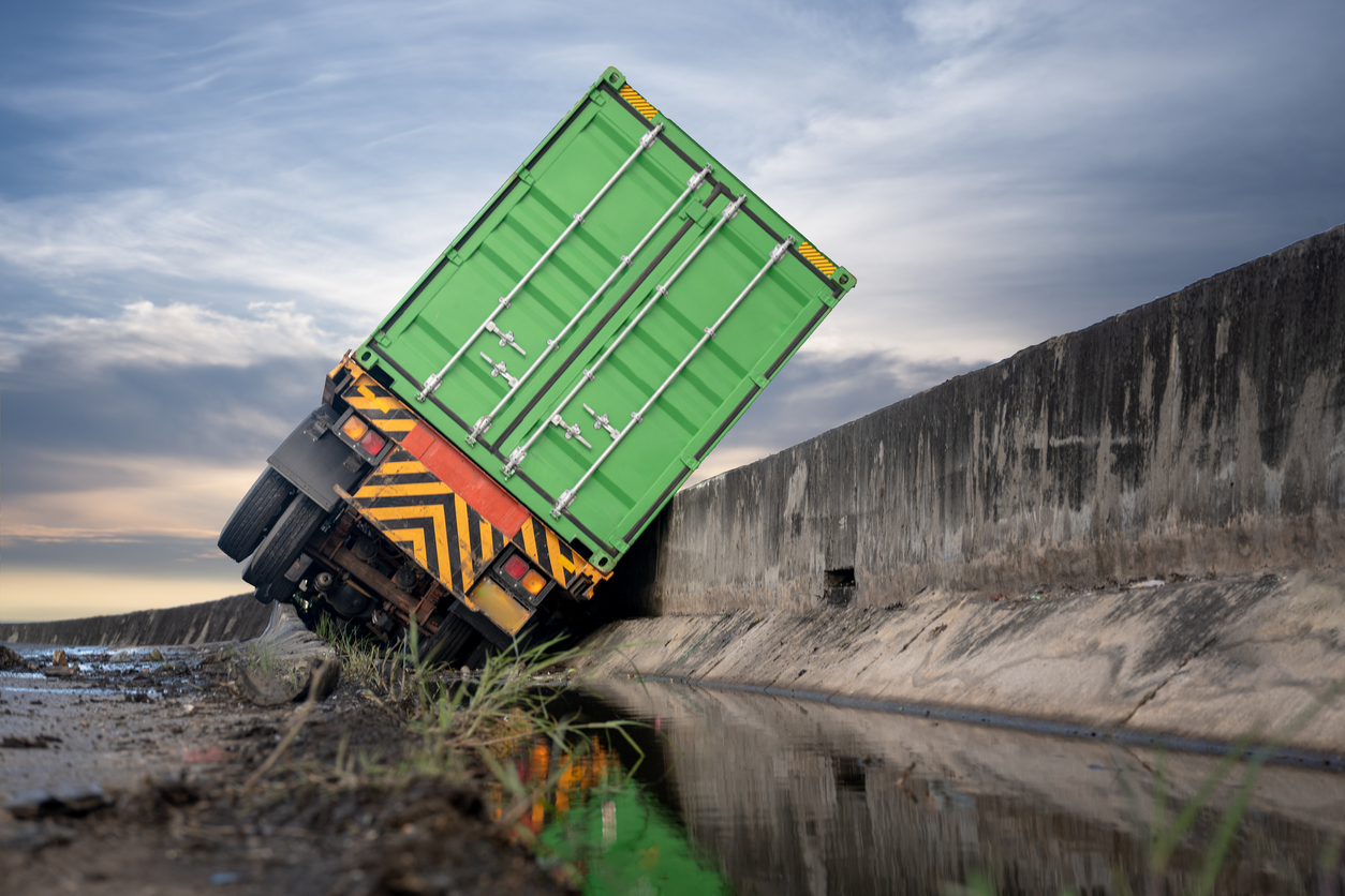 truck trailer lorry transport delivery container unit in clashed accident on the roadside, drive at rist of the high level of insurant