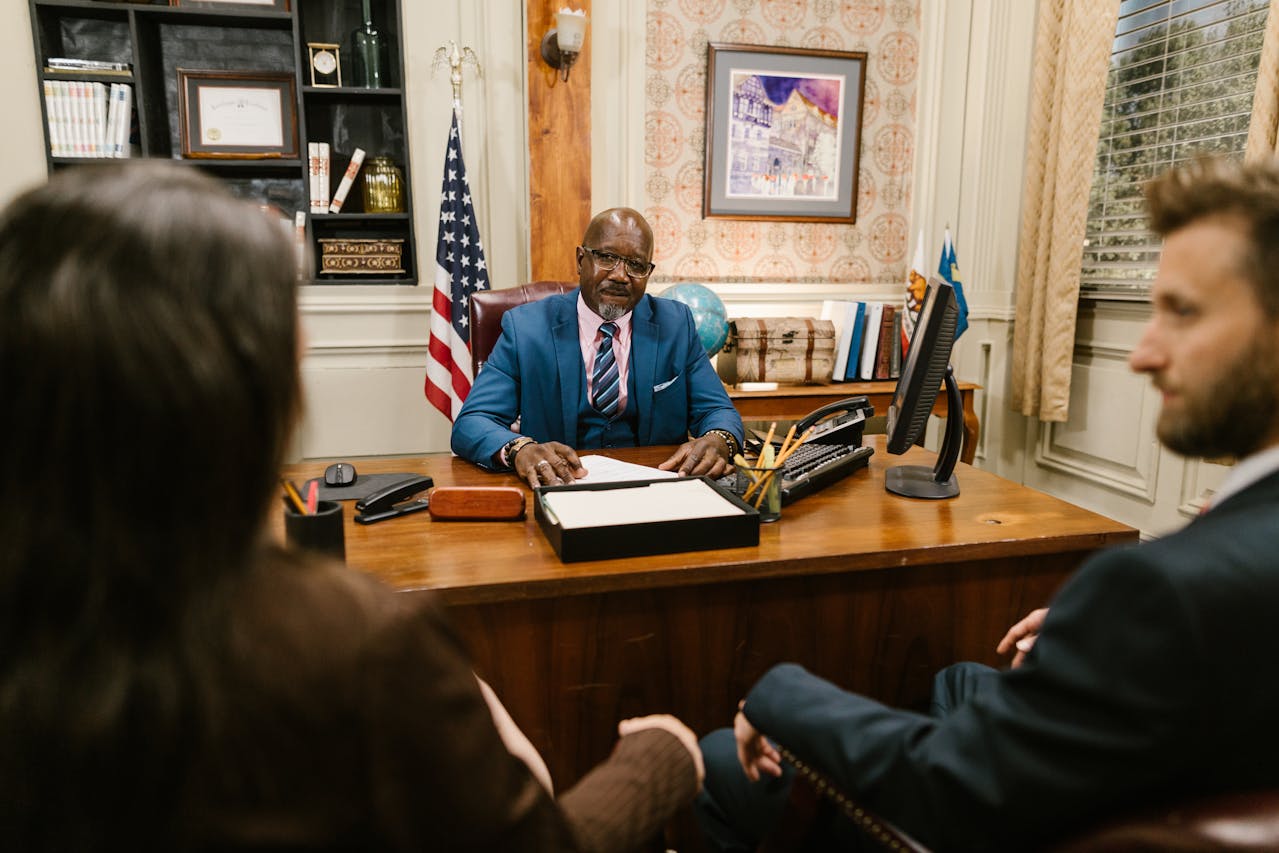 A Group People Having a Meeting inside the Office