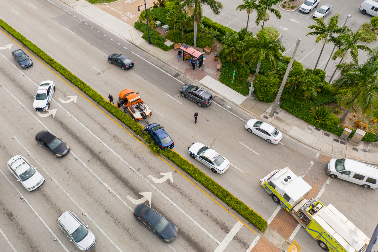 aerial photo of a car accident with police directing traffic