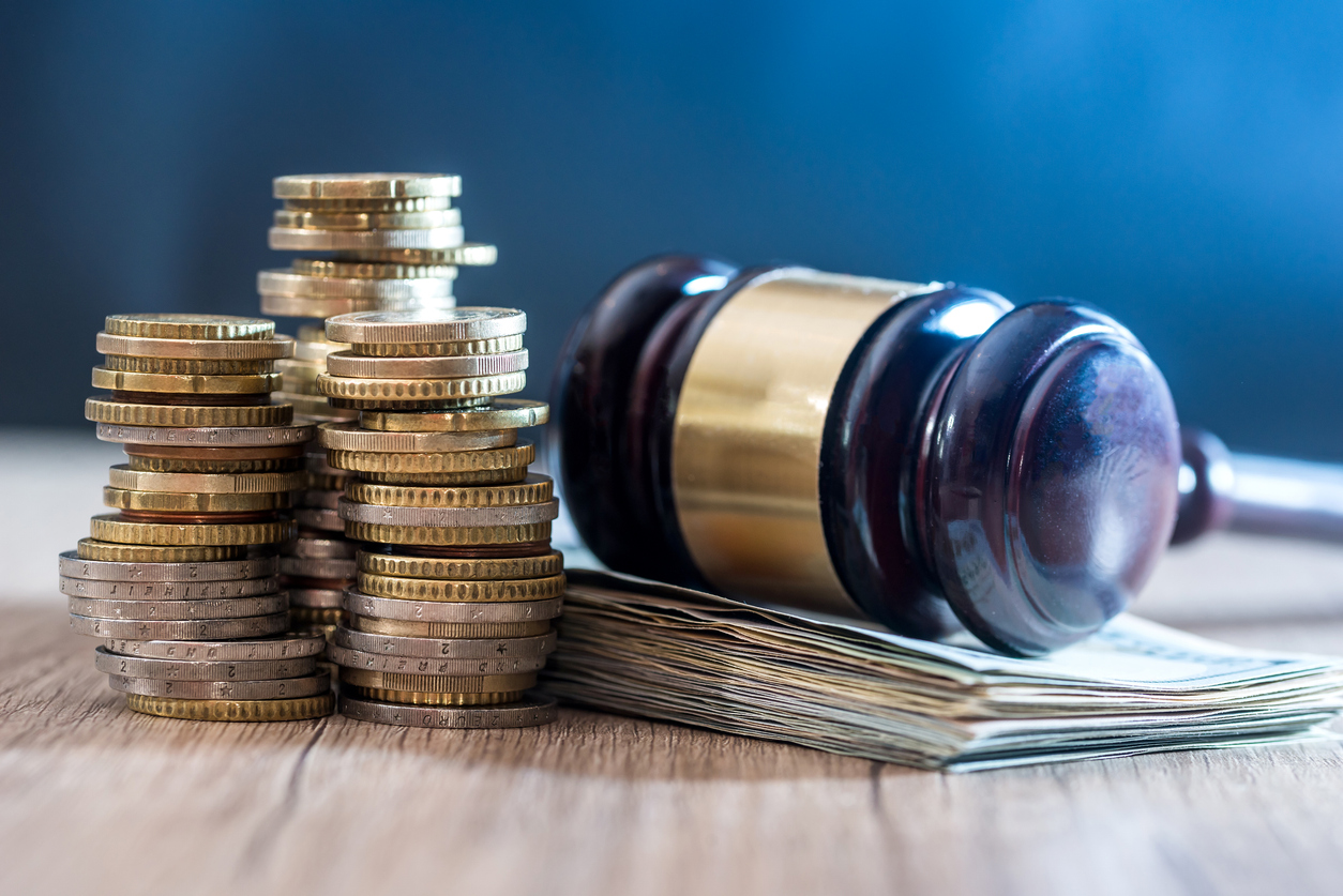 gavel with euro banknotes and coin. close up