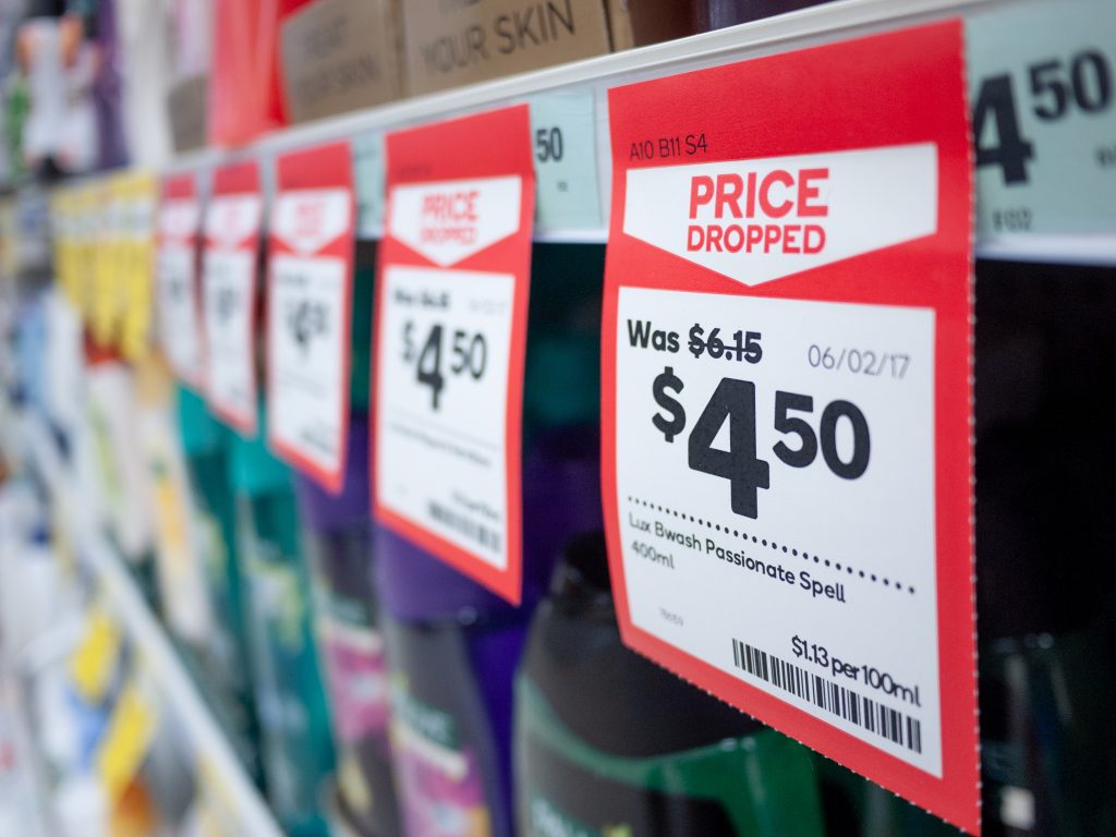 ACCC sues Coles and Woolworths over fake discount claims