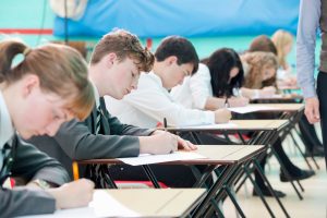 close,up,of,focused,middle,school,students,taking,examination,at