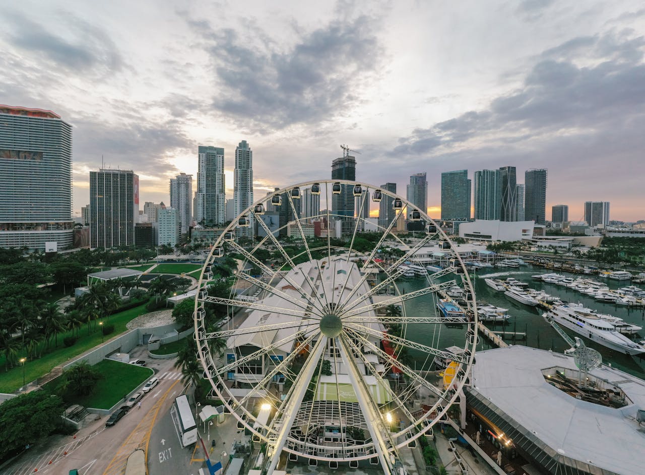 Ferris Wheel Near City Buildings