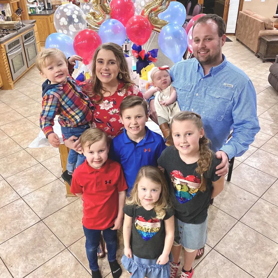 Anna and Josh Duggar with six of their seven children before his arrest