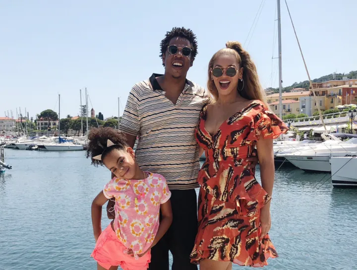 Blue Ivy, Jay-Z, and Beyoncé pose for a family photo. (Byonce's Instagram)