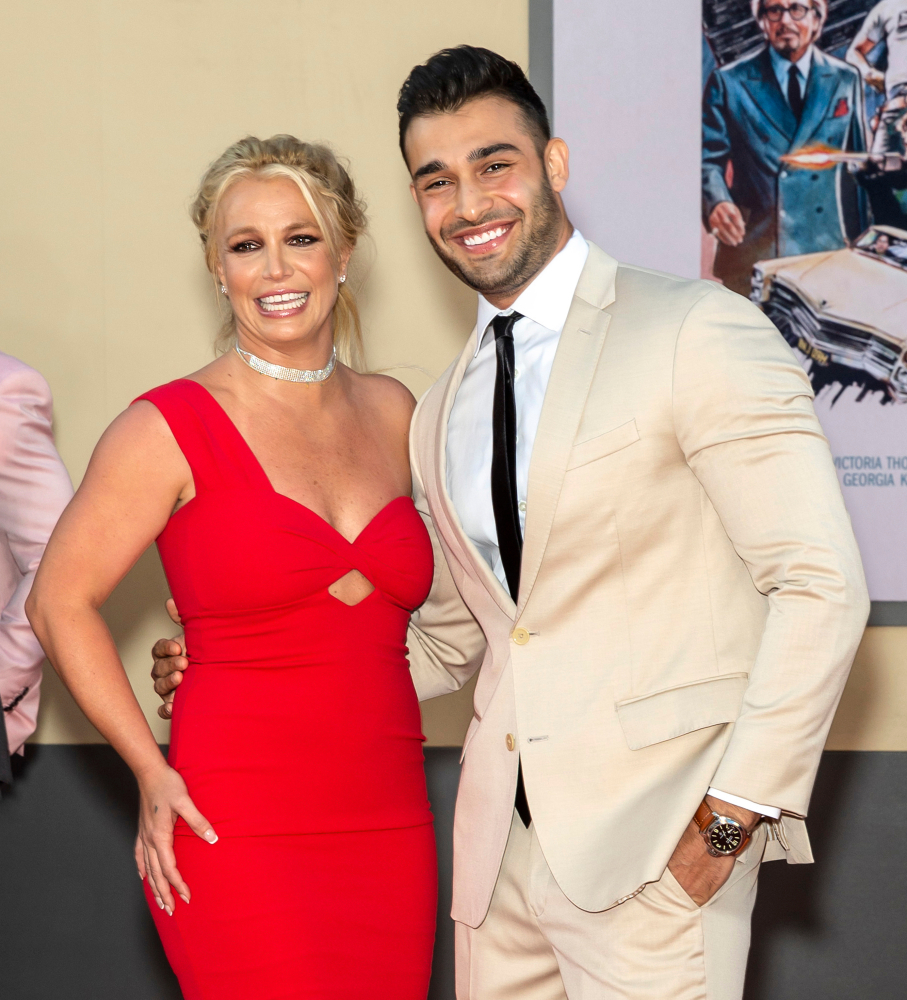 Britney Spears and Sam Asghar attend The Los Angeles Premiere Of "Once Upon a Time in Hollywood" held at TCL Chinese Theatre