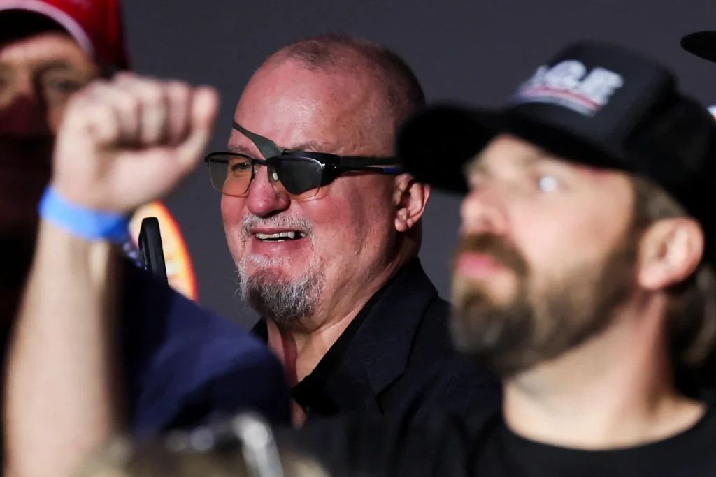 Oath Keepers Founder Stewart Rhodes Appears at Trump’s Las Vegas Rally After Prison Release