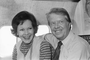 jimmy carter and his wife rosalynn share a moment aboard