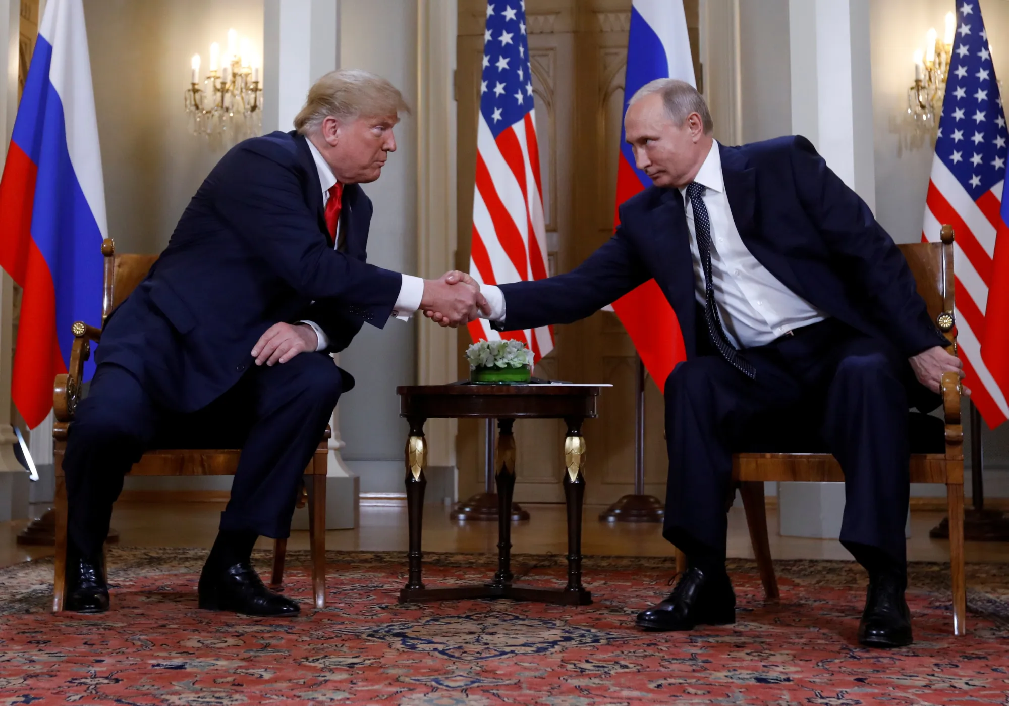 trump putin handshake