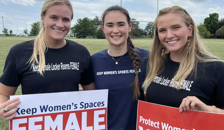 former ncaa division i swimmers kaitlynn wheeler and paula scanlan spoke at a rally in springfield, illinois, on july 13, 2023, in support of abbigail wheeler.