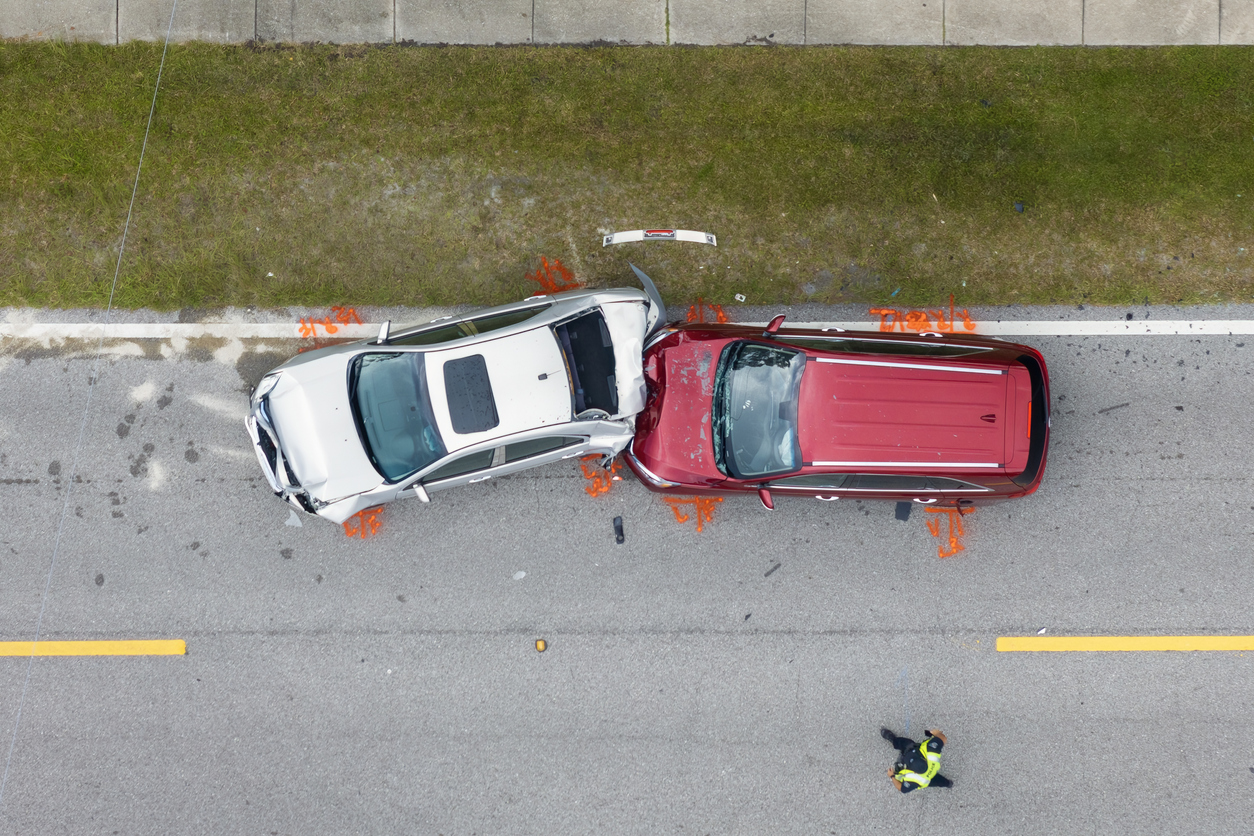 car crash with two vehicles collided at traffic accident site on american street