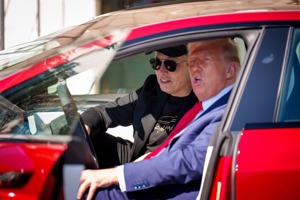 Donald Trump and Elon Musk in a Tesla